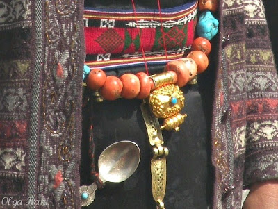 Gold amulet container attached to coral and turquoise necklace