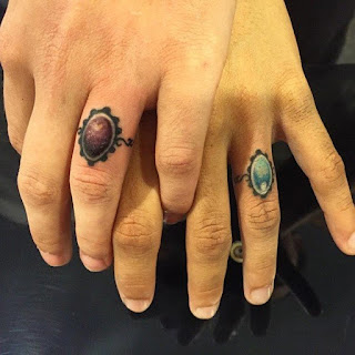 tattoo on finger ring