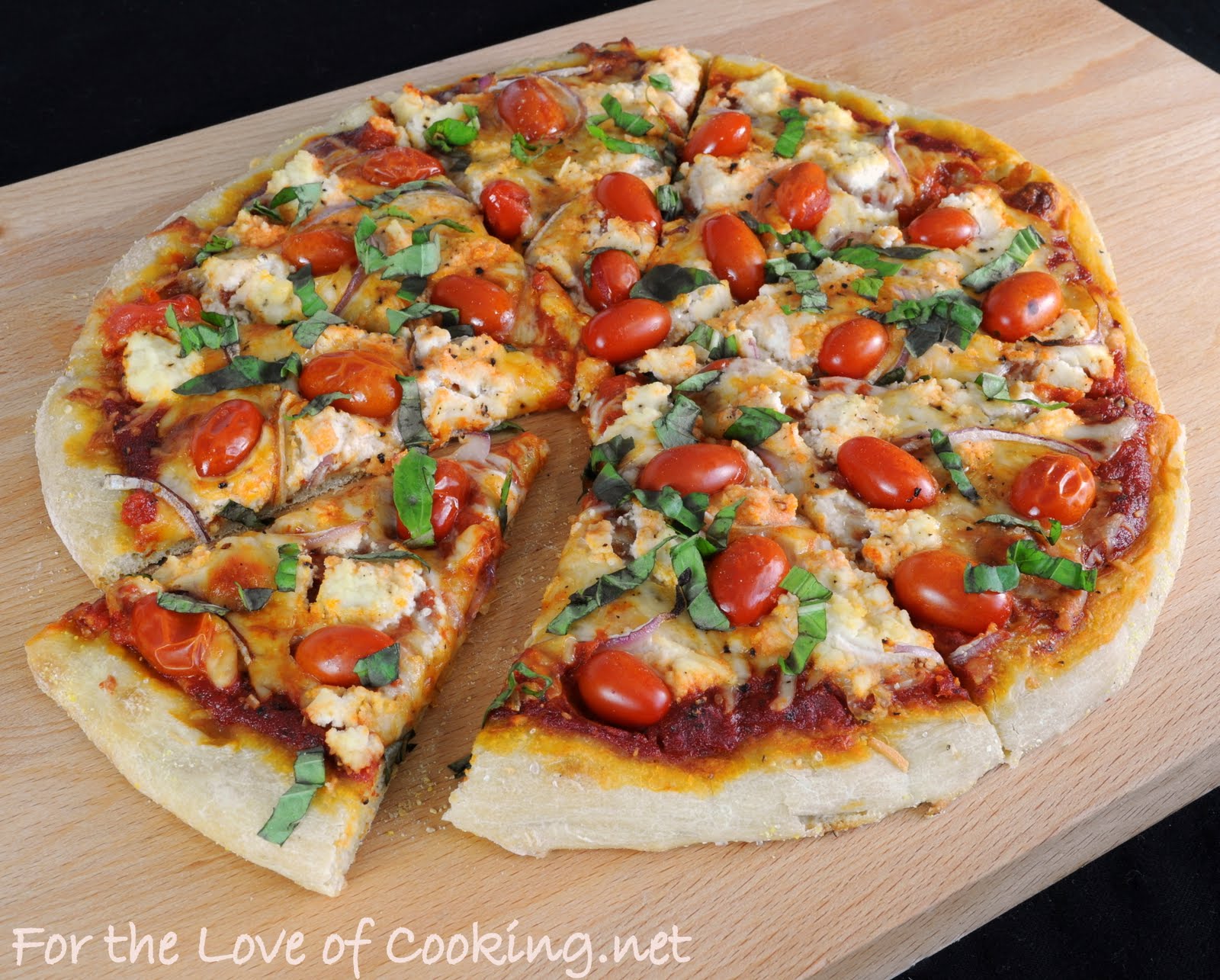 Pizza with Ricotta, Grape Tomatoes, Red Onion, and Fresh Basil For
