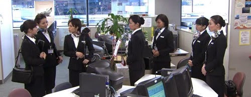 Asou and Maruyama talk to the group of cabin attendants.