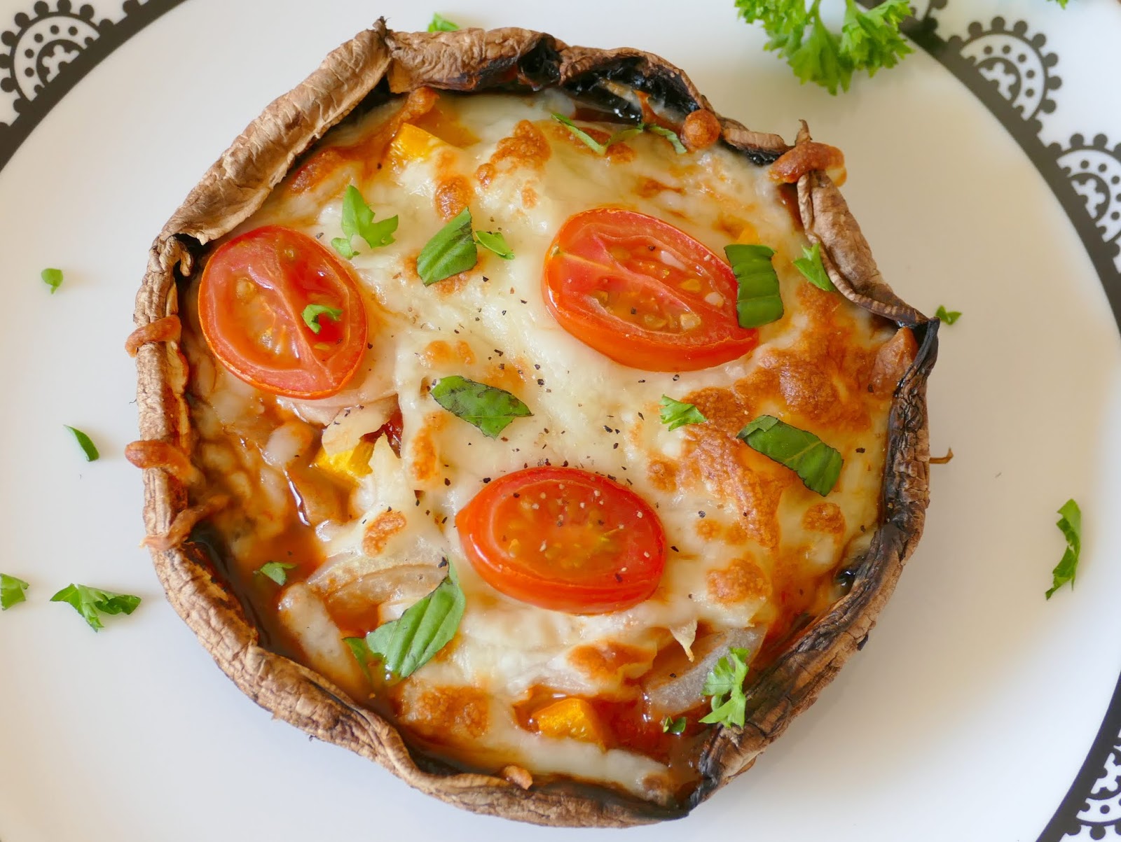 This easy and delicious low carb lunch or dinner recipe is vegetarian, but it would be even more delicious by adding sausage, pepperoni, ham or chicken! Customize with your favorite pizza toppings, herbs or cheese! These portobello mushroom pizzas are a perfect weeknight meal!