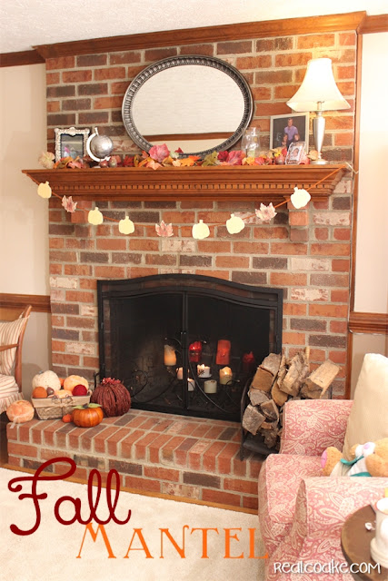 Simple fall decorating ideas for a mantel using pumpkins and inexpensive diy crafts from realcoake.com