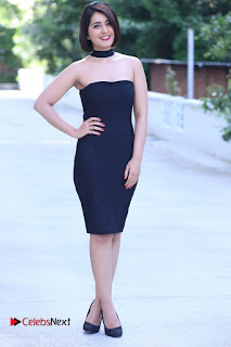 Actress Raashi Khanna Latest Pictures in Black Short Dress  0017