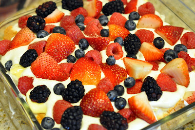 This easy fresh strawberry berry trifle with angel food cake recipe just combines angel food cake, vanilla pudding & Cool Whip topped with fresh berries to make a light red, white, and blue summer dessert.