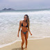 Monique Amin displays slim silhouette to the beach in bikini posing