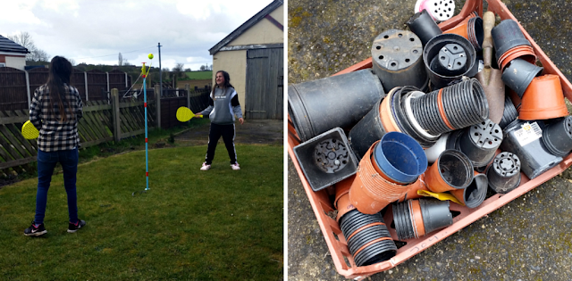 My girls in the garden playing swingball and a box of plant pots