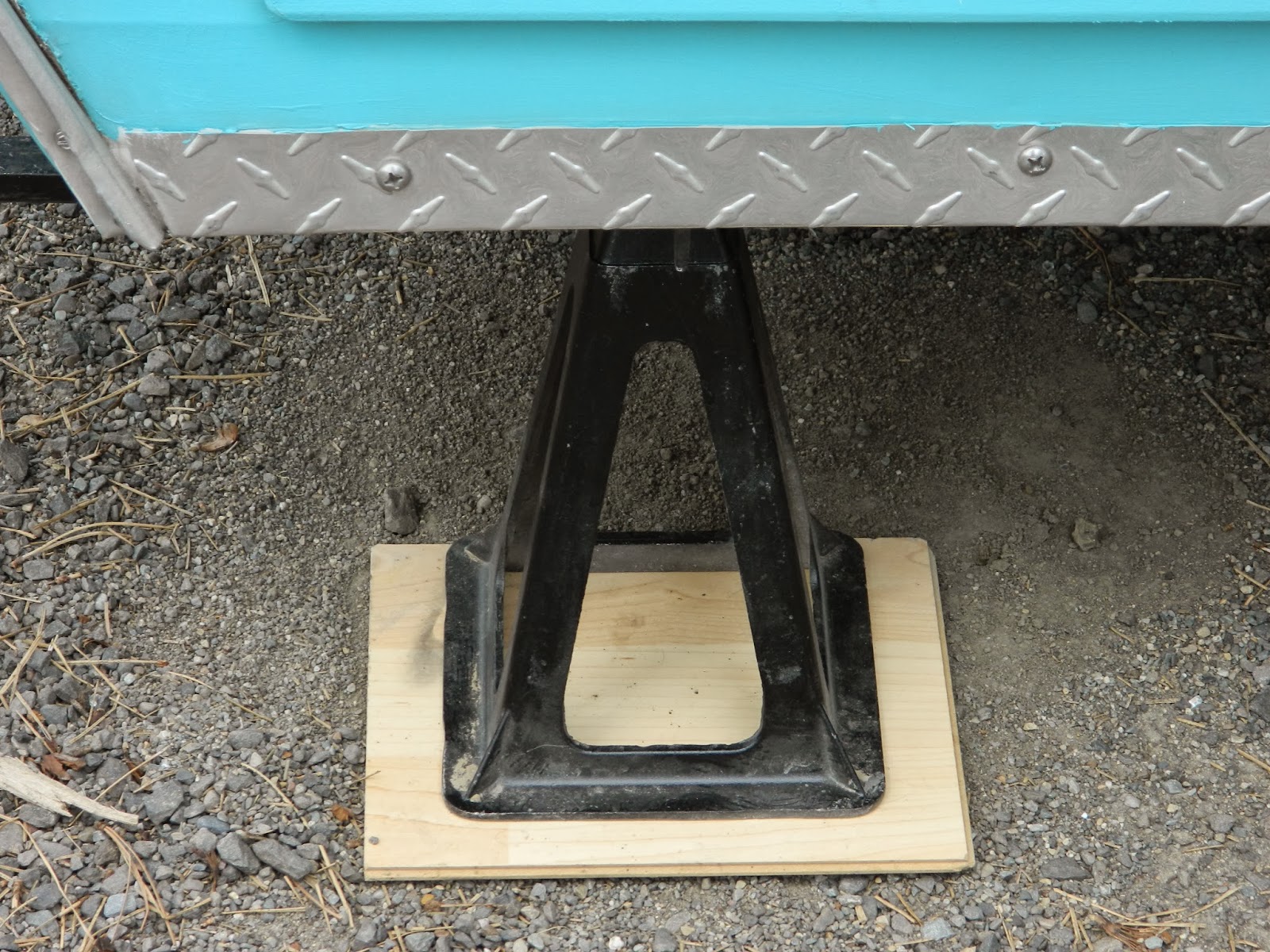 Girl Camping Tip for Using Stabilizer Jacks With Your Camp Trailer