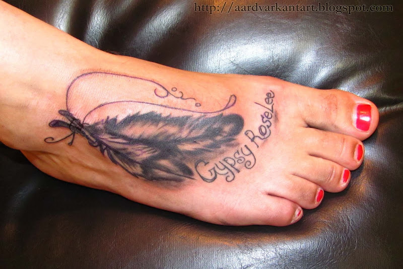feather tattoos pictures title=
