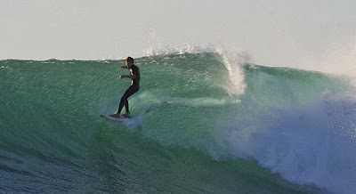 Practicando surf