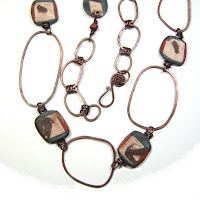 Copper Rings and Scroddled Clay Necklace