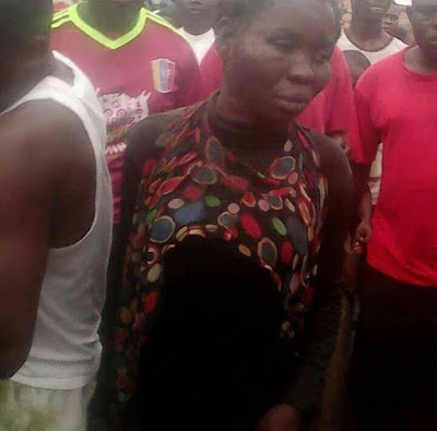 a Woman caught while making an attempt to kidnap a child in Lagos (photos)