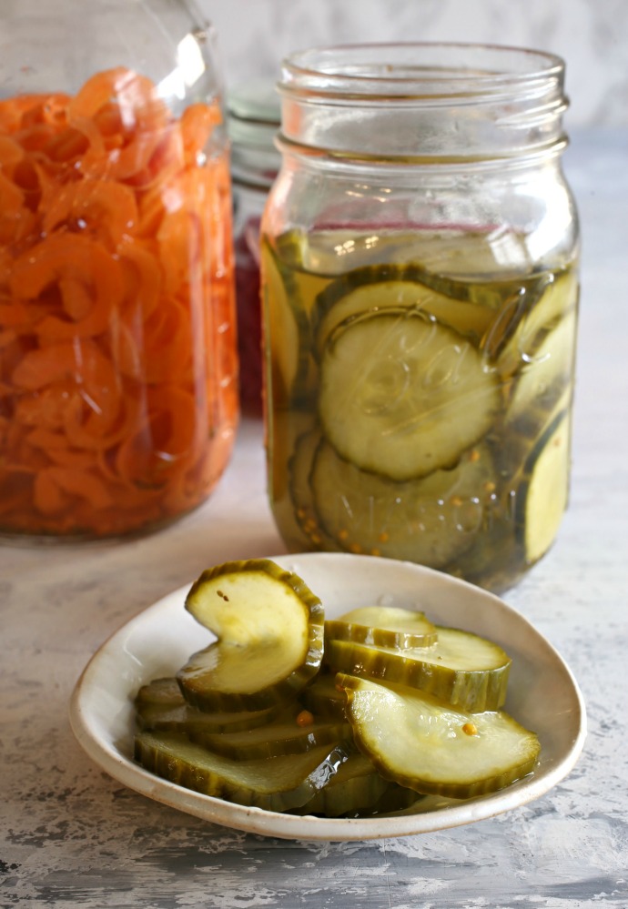 Quick pickled cucumbers, red onions and carrots.