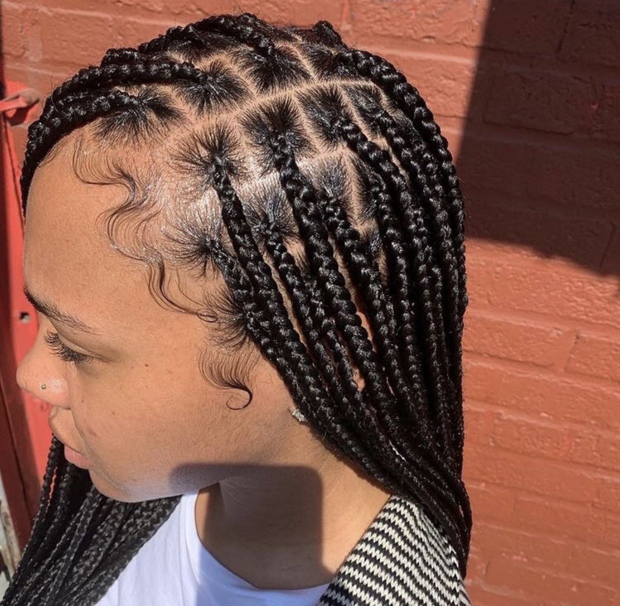 Catch the trendy hairstyle - knotless box braids.