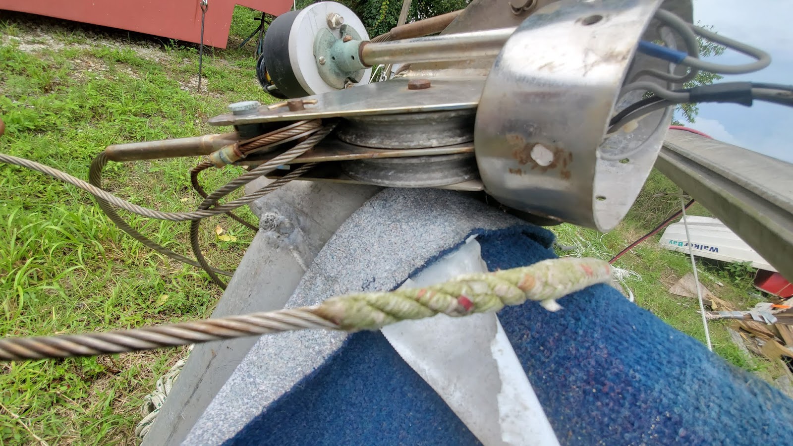 Sailing Whimsy Starting on rewiring the sailboat mast.