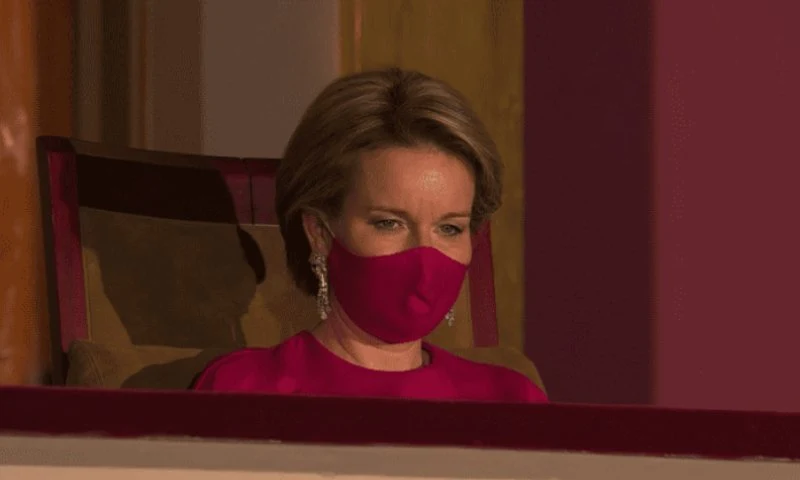 Queen Mathilde wore a red fuchsia silk gown from spring summer 2020 collection of Natan. Queen Elisabeth Piano Competition 2021