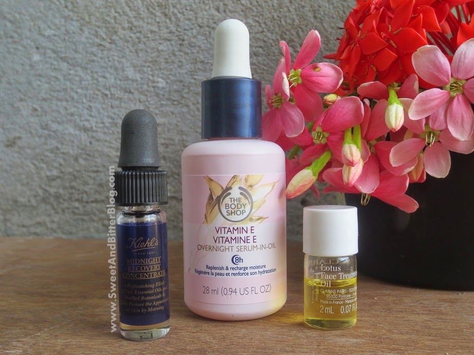 The Body Shop Overnight Vitamins E Serum in Oil with Kiehl’s Midnight Recovery Oil and Clarins Face Treatment Oil