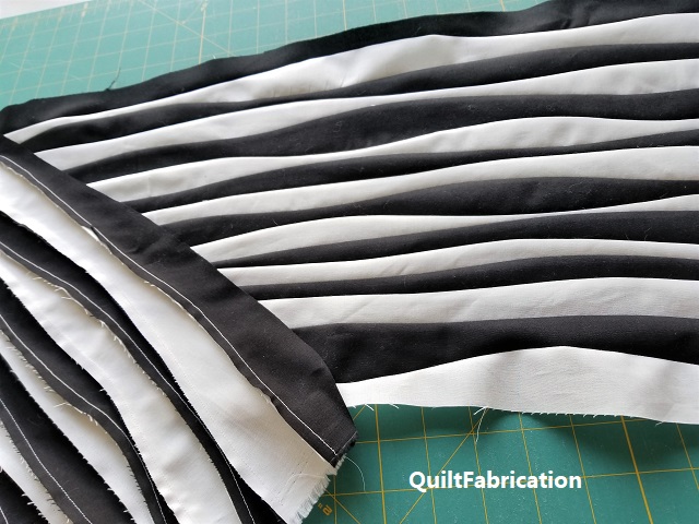 mat cut and sewn wavy stripes