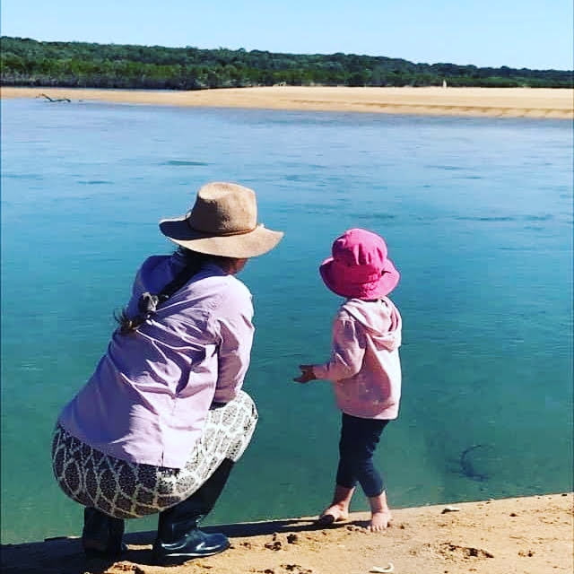 Mother and daughter at beach