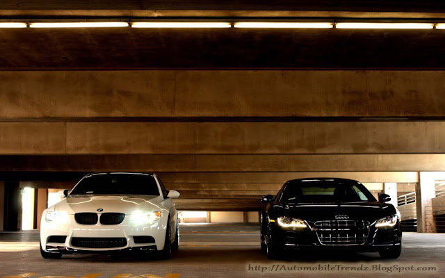 Black Audi R8 and White BMW