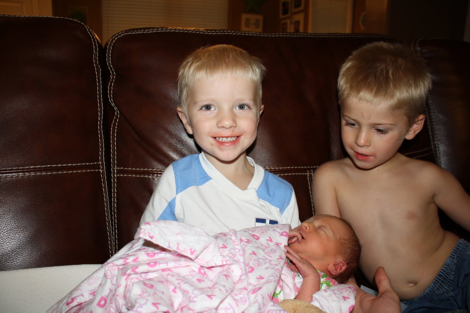 San & Quinn: These boys love their baby sister