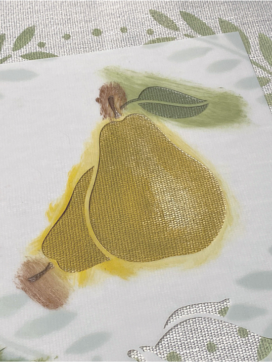 Pear stencil on a placemat