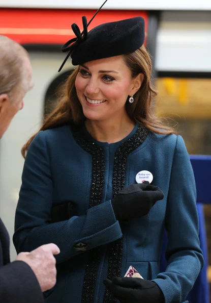 Queen Elizabeth II, accompanied by Prince Philip and Kate Middleton visited the Baker Street underground station