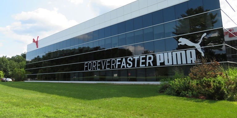 parent company of puma