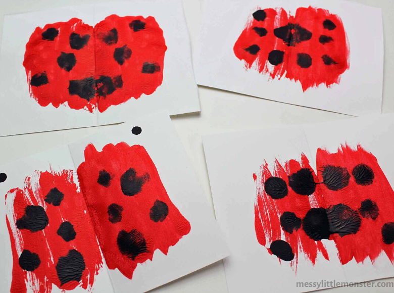 symmetry art ladybug craft - make the wings using a squish art painting technique.