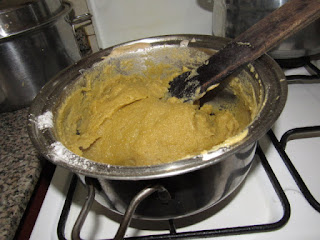 stirring irish potato fufu