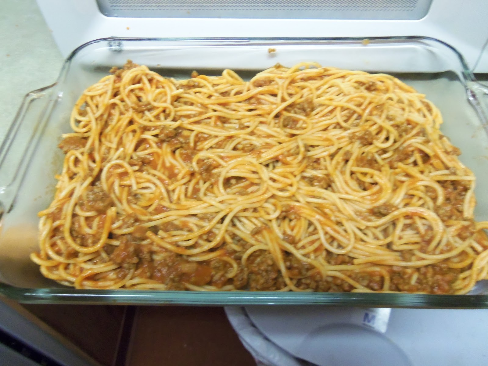 Meals 25 or Less Baked Spaghetti, Salad, and Garlic Bread