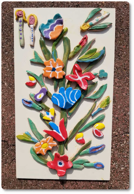 Ceramic art mounted to wood makes hanging art much simpler How to hang clay art arrached to wood