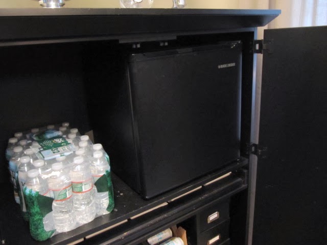 computer desk turned beverage cabinet