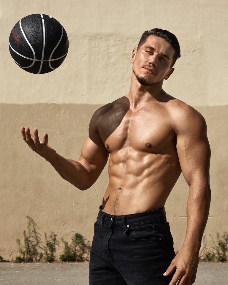 masculine-russian-hunk-shirtless-fit-muscular-man-playing-basketball