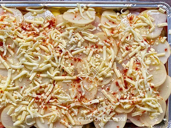 Potatoes and cheese added to vegetable bake