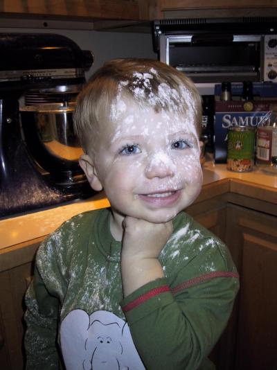 Boy covered with flour
