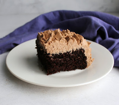 piece of devilishly good chocolate cake with chocolate buttercream