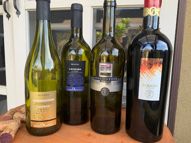 four velenosi wine bottles