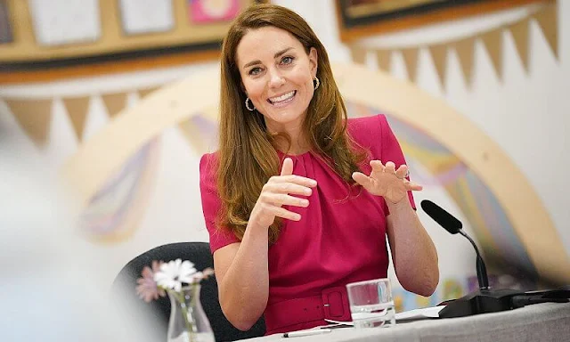 Kate Middleton wore a Nadalia top from Ralph Lauren, and gold hoops with pearls from Freya Rose