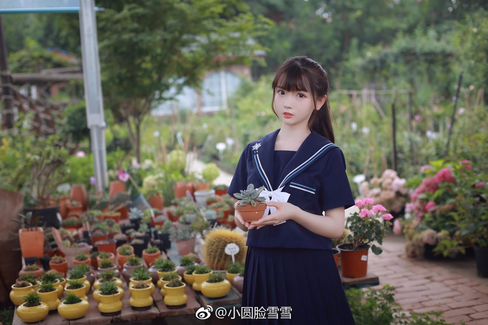 Chinese cute model - Little girl in the flower garden