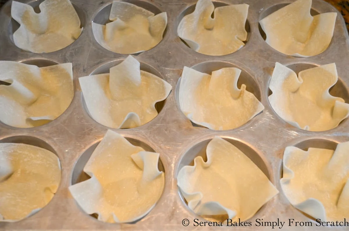 Muffin Tin filled with Wonton Wrappers.