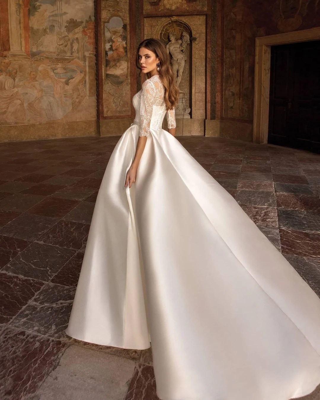 Iconic elegant celebrity wedding dresses of 2021 | Melody Jacob