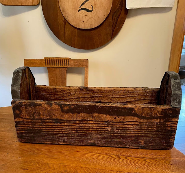 Photo of a rustic wooden toolbox