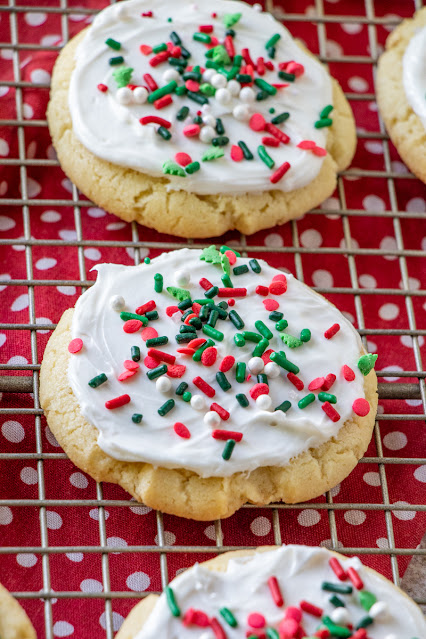 The Best Vanilla Almond Frosted Sugar Cookies christmas on a wire rack