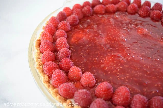 add fresh raspberries to top of pie
