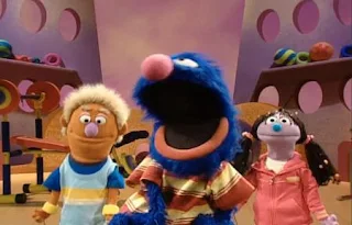 Grover's Fuzzy and Blue and Healthy Too show airs on the Happy Happy Healthy Monsters network. Grover has two assistant named Bobby and Sissy