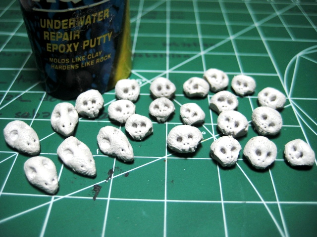 Don Suratos aka DC23: Epoxy Clay skulls for miniature basing