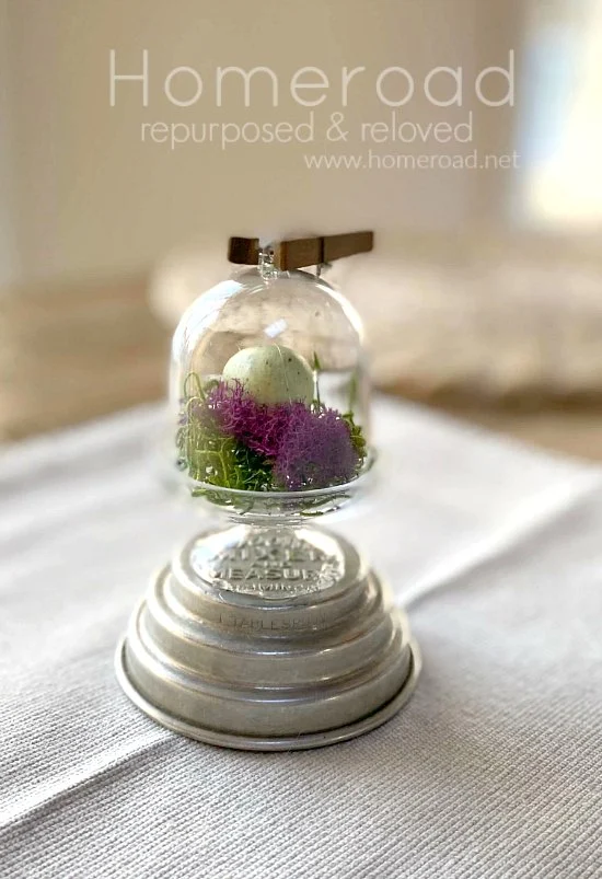 mini cloche with moss and egg