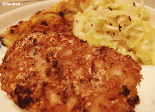 Schnitzel served with some cabbage salad