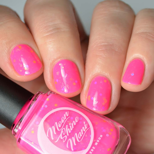 neon pink nail polish with glitter