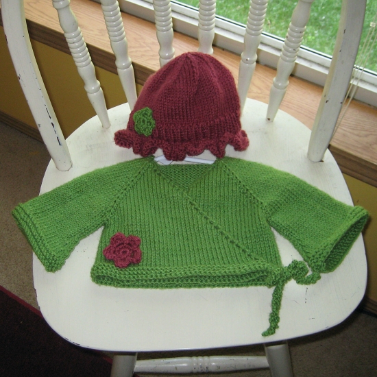knitted baby sweater and hat